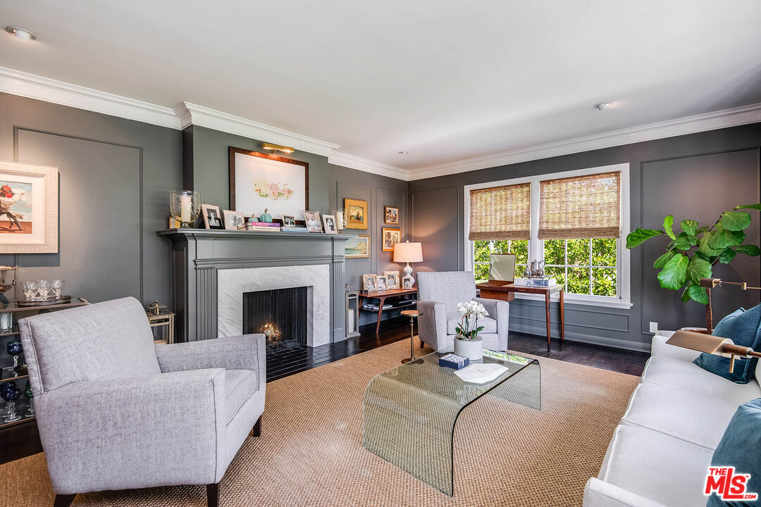 2755 McConnell Drive Los Angeles, CA 90064 - Photo 5 of 47 a living room with furniture and a fireplace