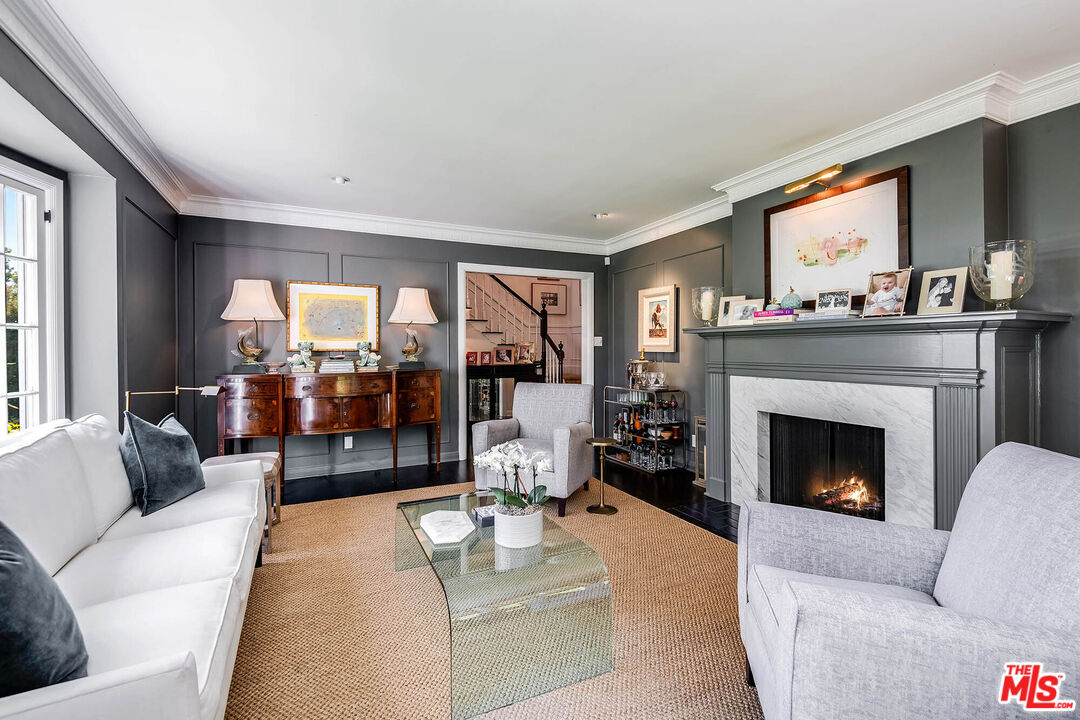 2755 McConnell Drive Los Angeles, CA 90064 - Photo 7 of 47 a living room with furniture and a fireplace