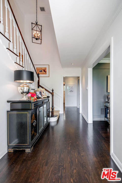 2755 McConnell Drive Los Angeles, CA 90064 - Photo 8 of 47 a kitchen with stainless steel appliances granite countertop a stove and a wooden floors