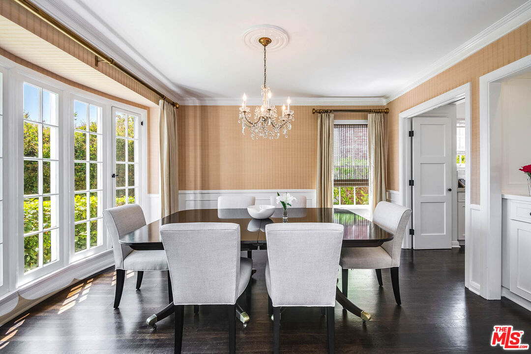 2755 McConnell Drive Los Angeles, CA 90064 - Photo 10 of 47 a view of a dining room with furniture window and wooden floor