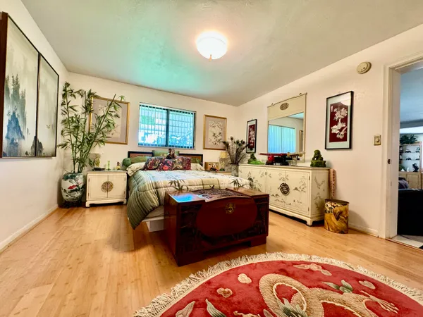 a view of a livingroom with furniture and window