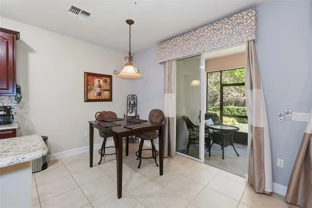a view of a livingroom with a walk in closet and a window