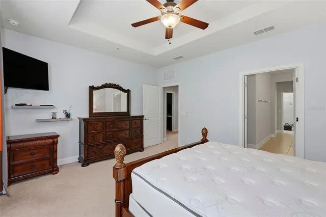 a spacious bathroom with a double vanity sink mirror and double
