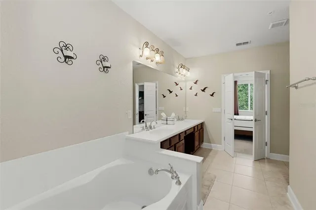 a bathroom with a shower and a sink