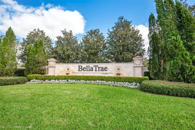 a view of swimming pool with outdoor seating and plants
