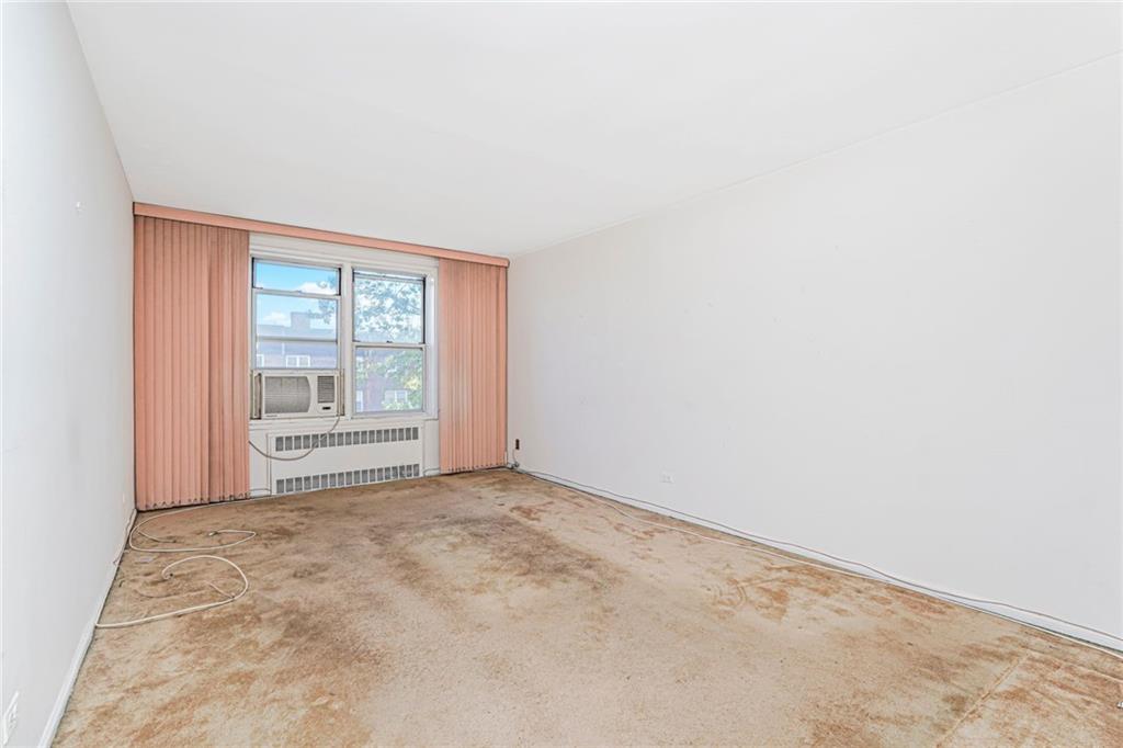 2514 East 7th Street, Unit 6J Brooklyn, NY 11235 - Photo 15 of 17 an empty room with windows