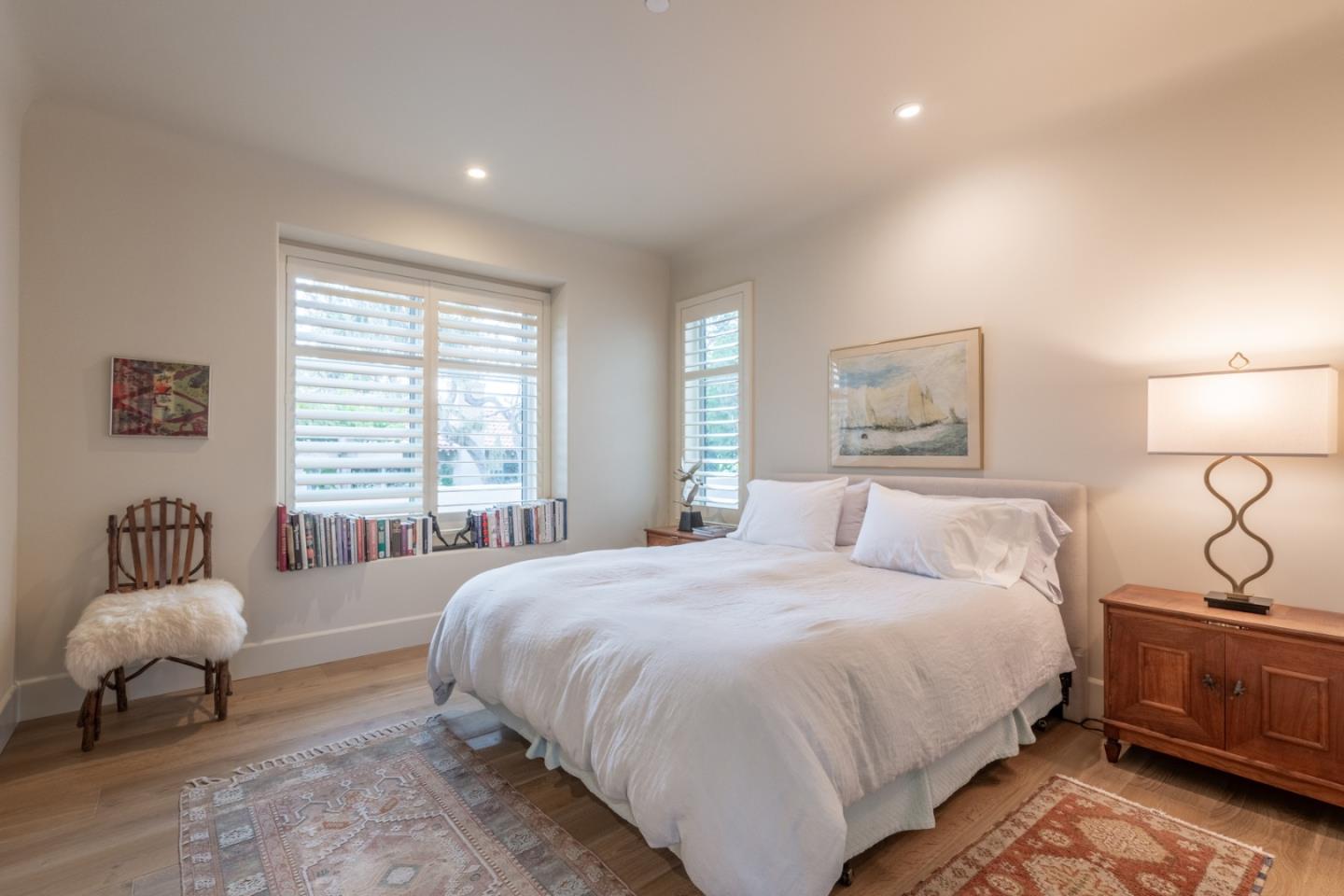 1041 Rodeo Road Pebble Beach, CA 93953 - Photo 12 of 18 a bedroom with bed and a window
