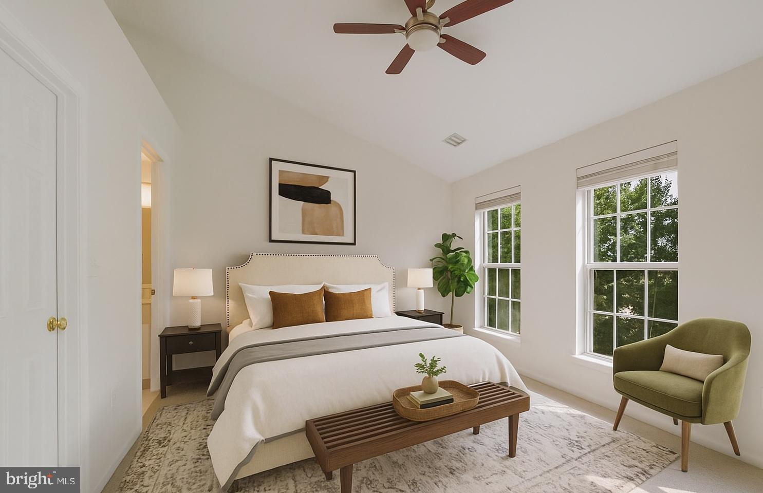 719 Main Street, Unit 719B Gaithersburg, MD 20878 - Photo 16 of 43 a bedroom with a bed and glass window