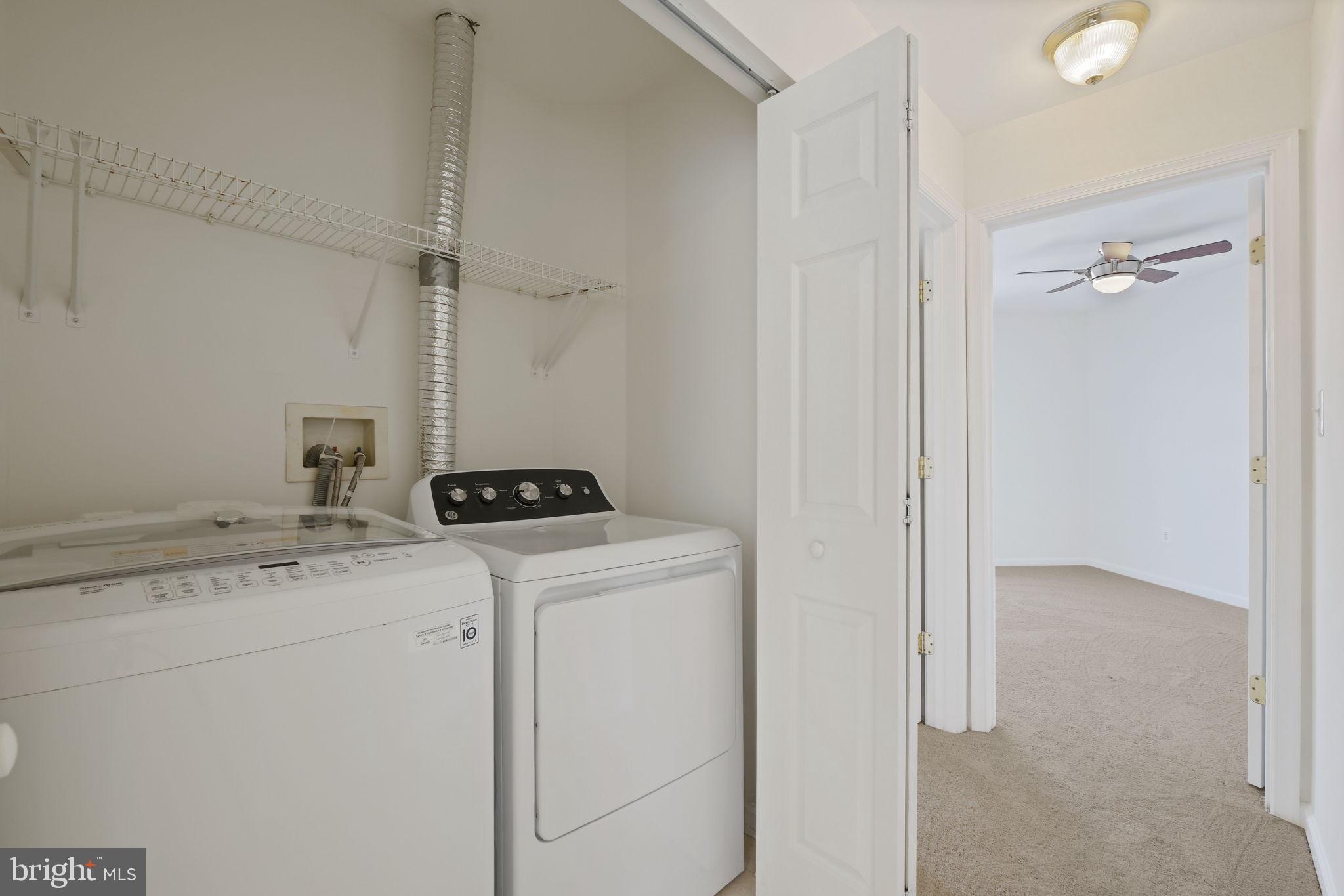 719 Main Street, Unit 719B Gaithersburg, MD 20878 - Photo 24 of 43 a utility room with dryer and washer