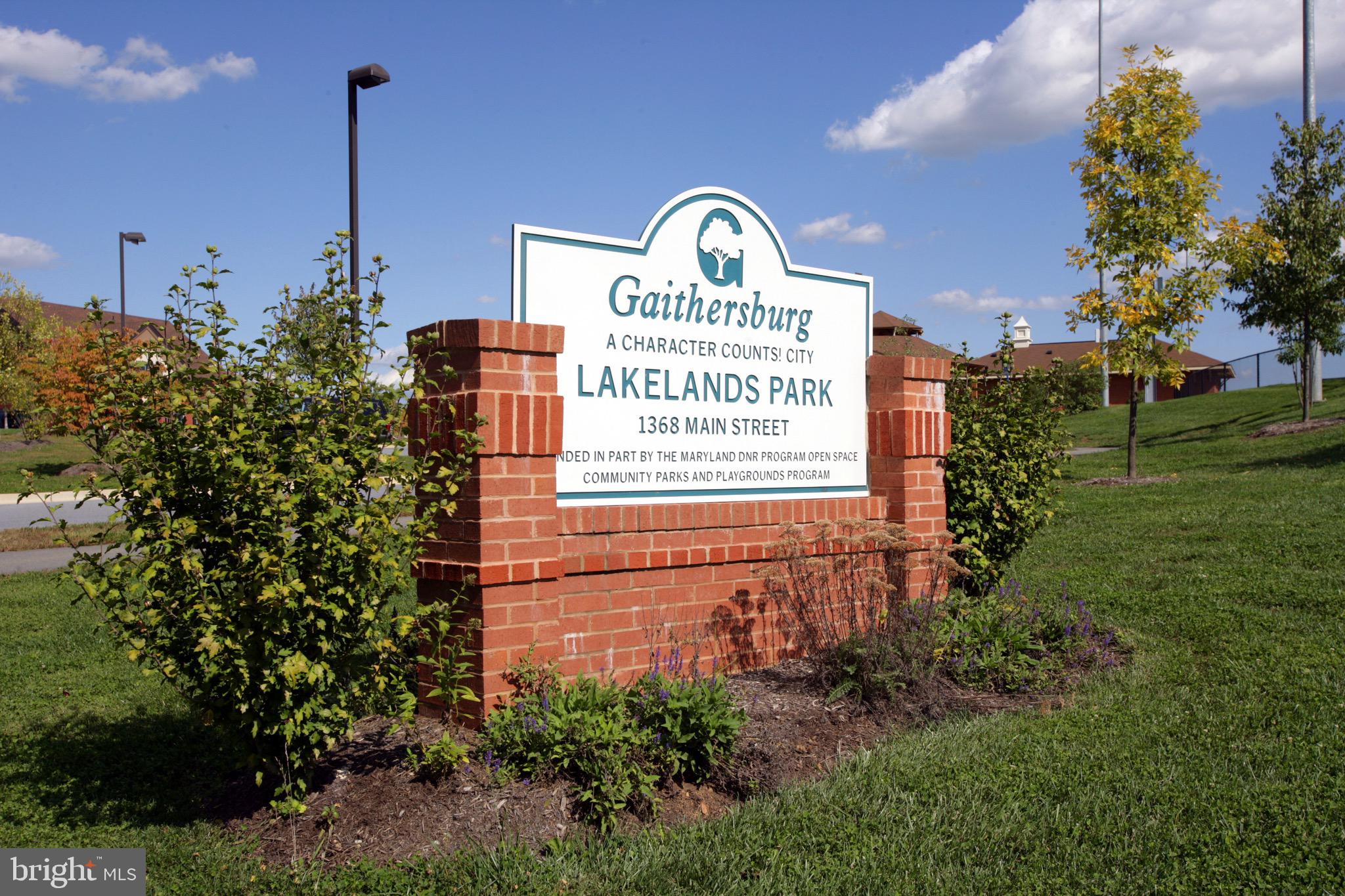 719 Main Street, Unit 719B Gaithersburg, MD 20878 - Photo 32 of 43 a view of a building with garden