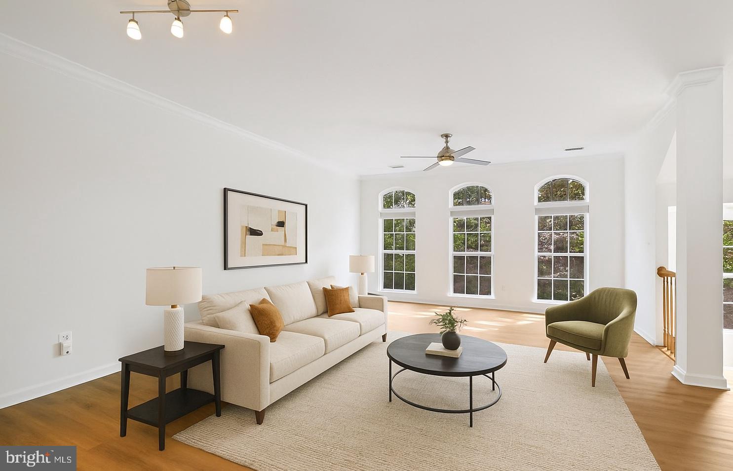 719 Main Street, Unit 719B Gaithersburg, MD 20878 - Photo 5 of 43 a living room with furniture and a large window