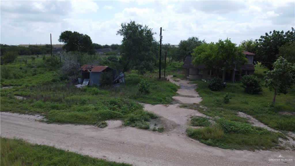 1524 West Hi Line Road Pharr, TX 78577 - Photo 18 of 34 a view of a dry yard with wooden fence