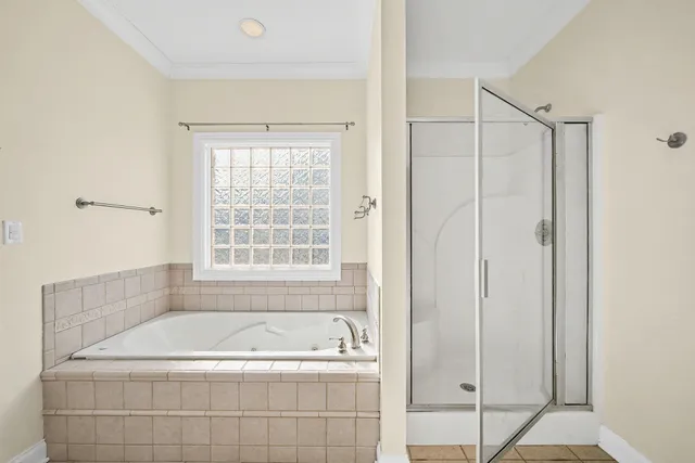 a bath tub sitting next to a window