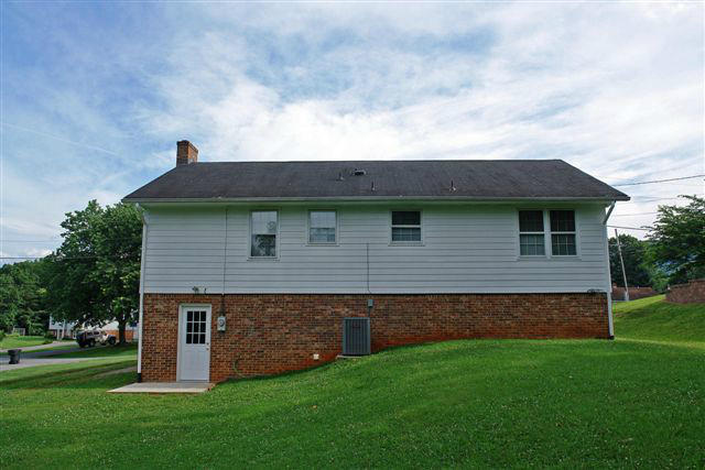 1608 Indian Rock Road Roanoke, VA 24014 - Photo 36 of 37 a front view of a house with garden