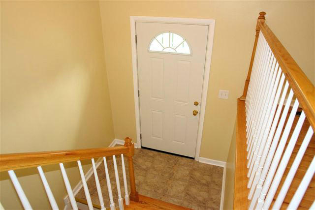 1608 Indian Rock Road Roanoke, VA 24014 - Photo 6 of 37 a view of a hallway with wooden floor