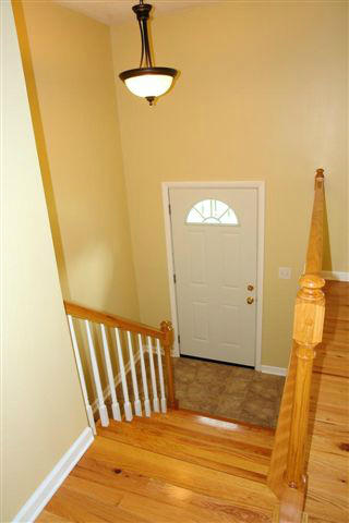 1608 Indian Rock Road Roanoke, VA 24014 - Photo 7 of 37 a view of a hallway with wooden floor