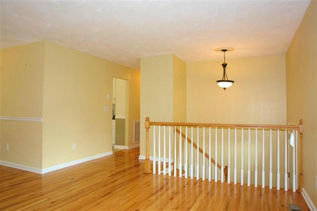 1608 Indian Rock Road Roanoke, VA 24014 - Photo 8 of 37 a view of hallway with wooden floor