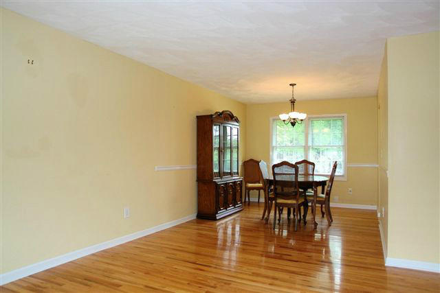 1608 Indian Rock Road Roanoke, VA 24014 - Photo 10 of 37 a view of a dining room with furniture and wooden floor
