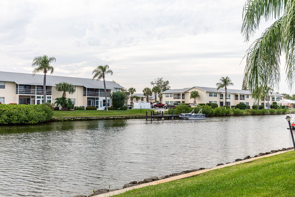 1815 Robalo Drive, Unit C201 Vero Beach, FL 32960 - Photo 31 of 31 a view of a lake with houses