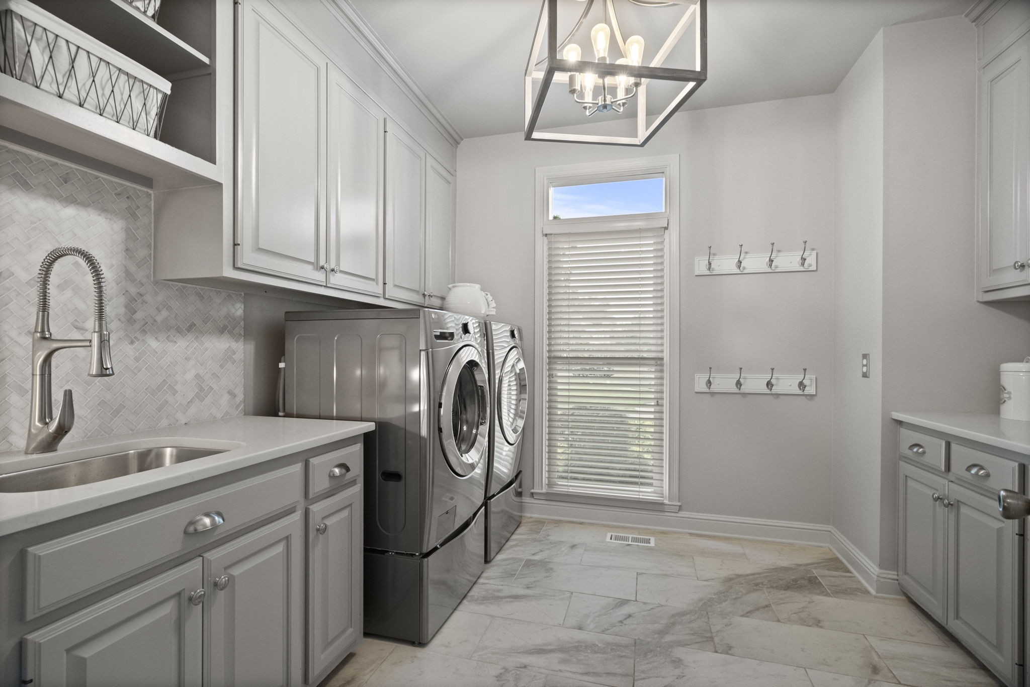 104 Riva Ridge Hendersonville, TN 37075 - Photo 23 of 66 a view of a storage & utility room with a sink dryer and washer