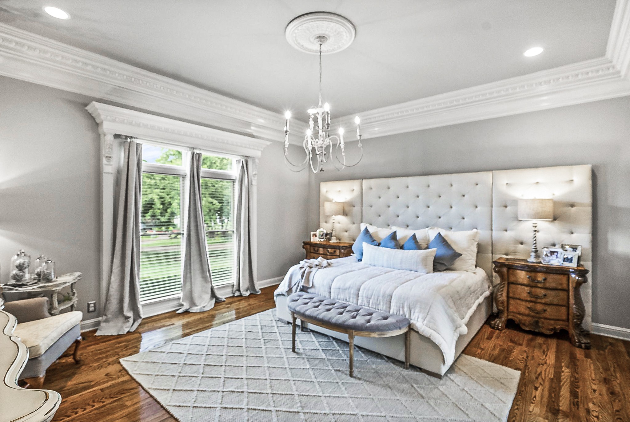 104 Riva Ridge Hendersonville, TN 37075 - Photo 25 of 66 a bedroom with a bed and a chandelier