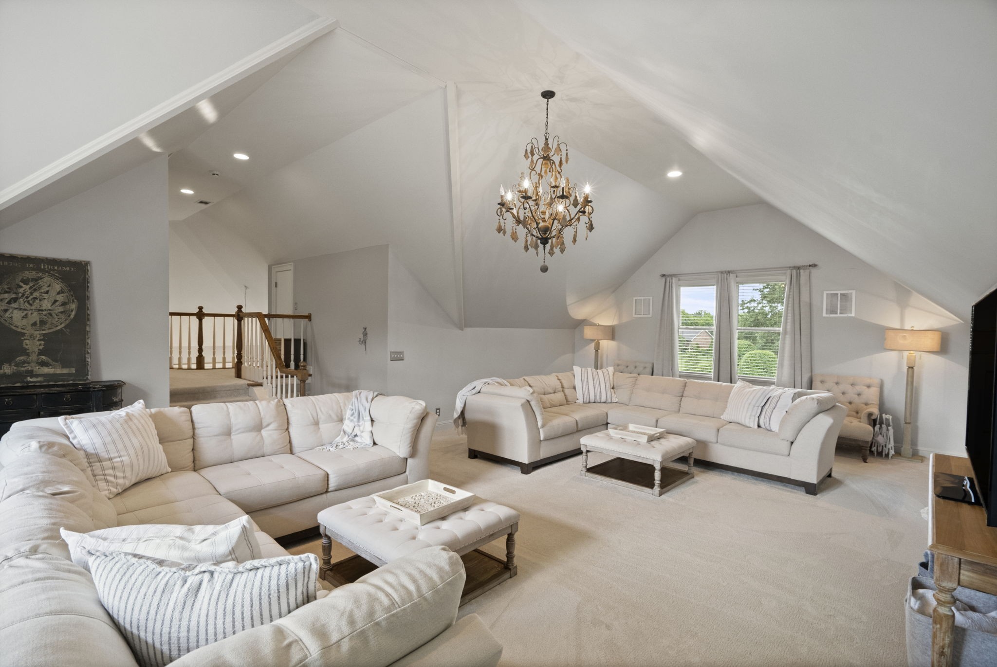 104 Riva Ridge Hendersonville, TN 37075 - Photo 41 of 66 a living room with furniture and a chandelier