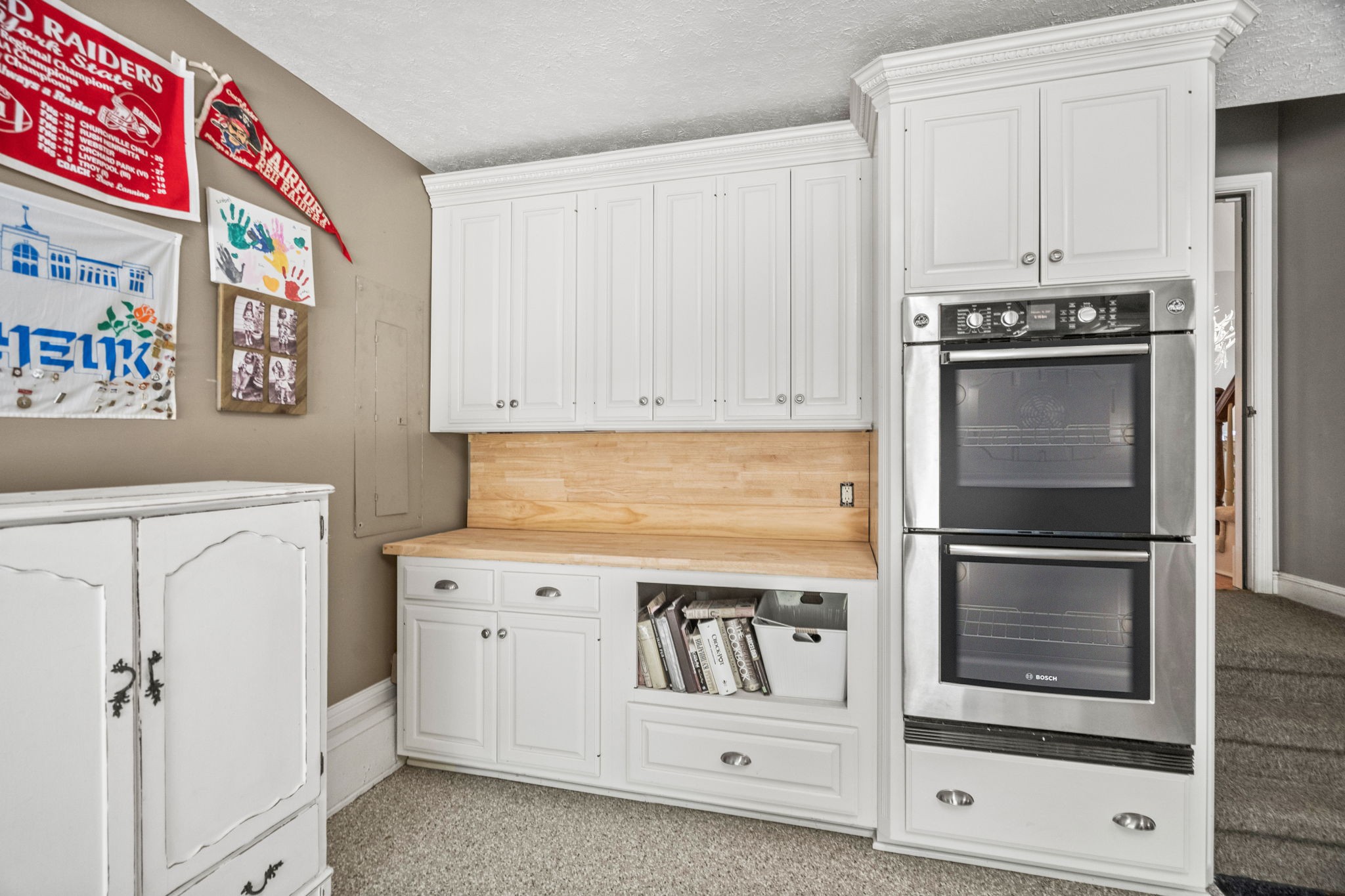 104 Riva Ridge Hendersonville, TN 37075 - Photo 47 of 66 a kitchen with white cabinets and white appliances