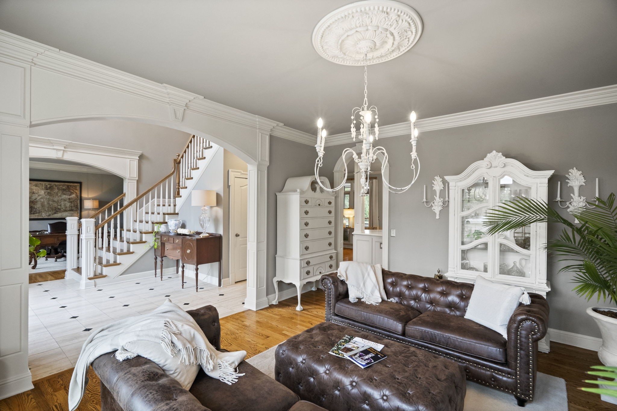 104 Riva Ridge Hendersonville, TN 37075 - Photo 6 of 66 a living room with furniture a chandelier and a chandelier