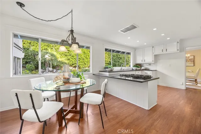 a view of a garden with a building