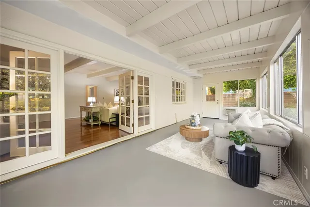 a spacious bathroom with a granite countertop sink a mirror and a