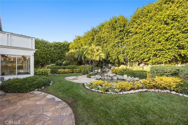 a bedroom with bed and a chair