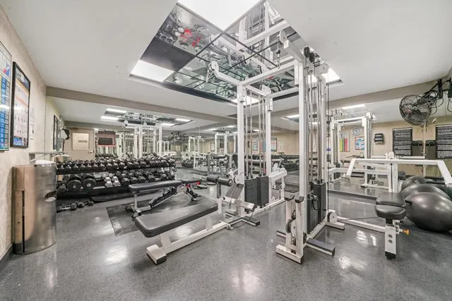 a view of a room with gym equipment