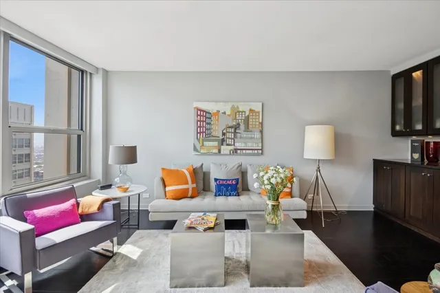 a living room with furniture and a window