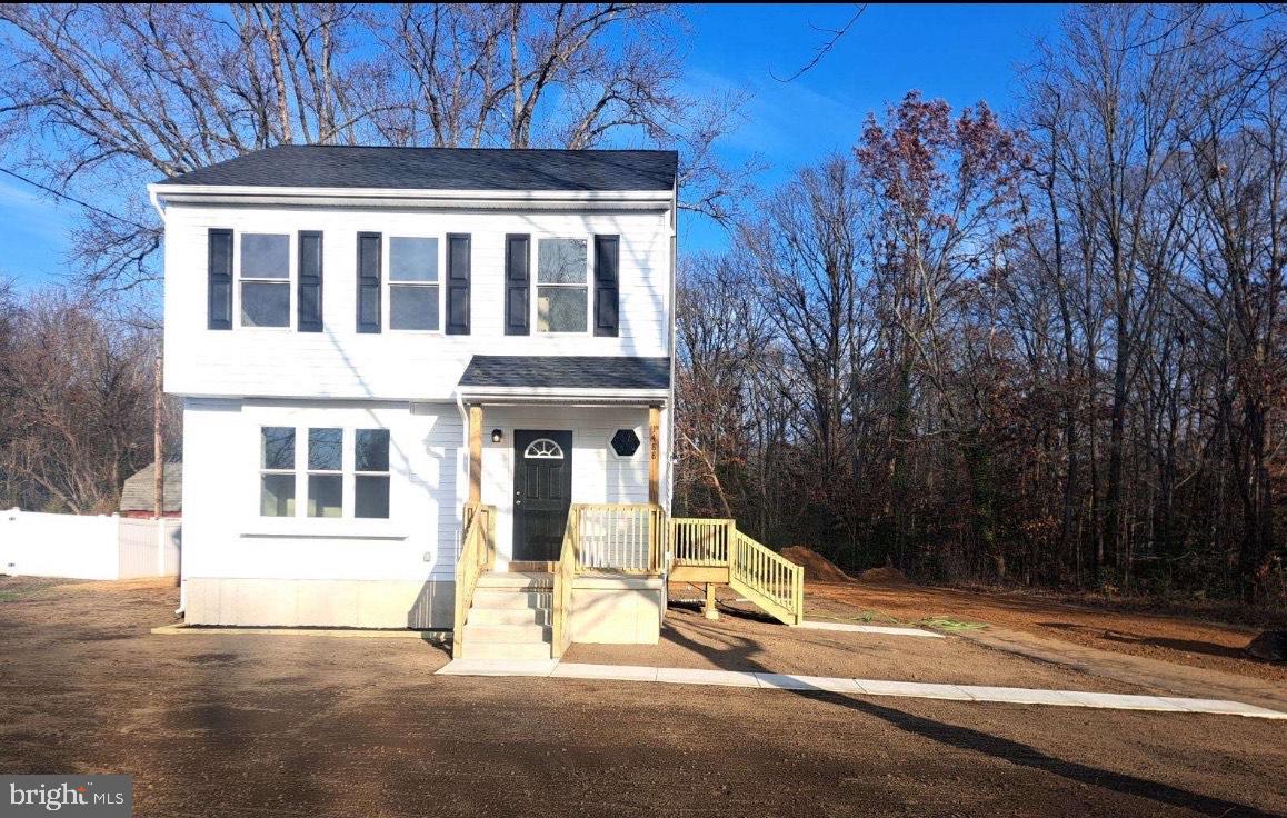 1488 North Tuckahoe Road Williamstown, NJ 08094 - Photo 1 of 27 a house with trees in front of it
