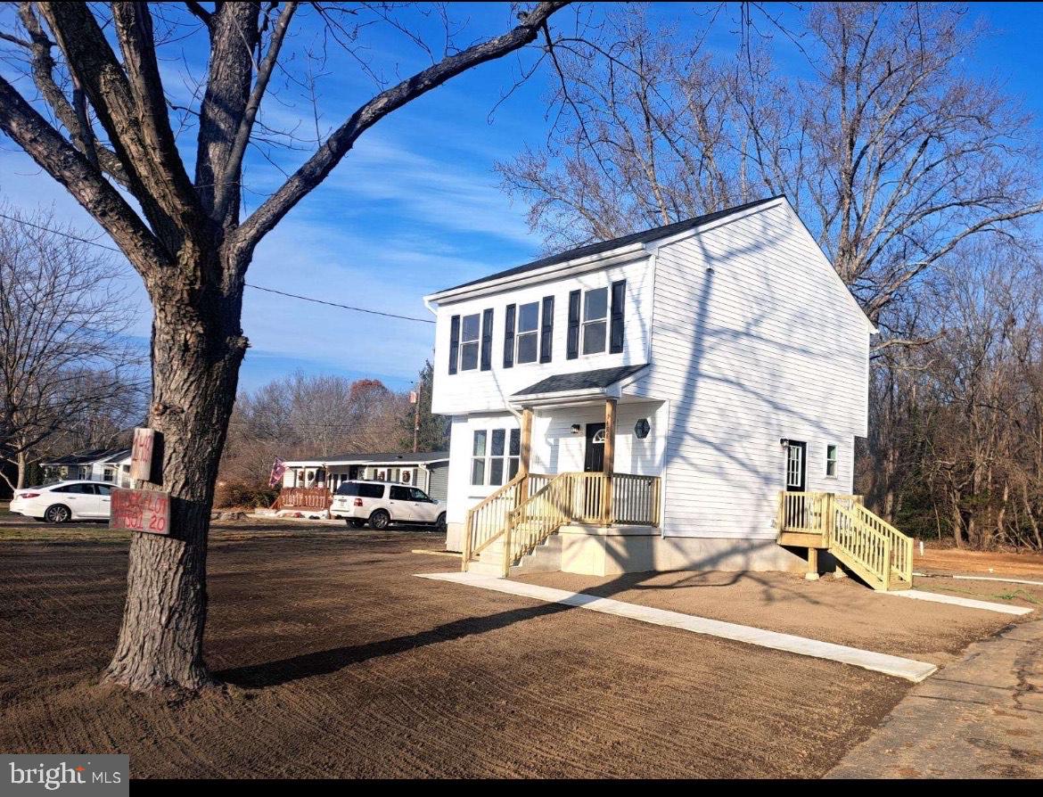1488 North Tuckahoe Road Williamstown, NJ 08094 - Photo 2 of 27 a view of a house with snow on the road