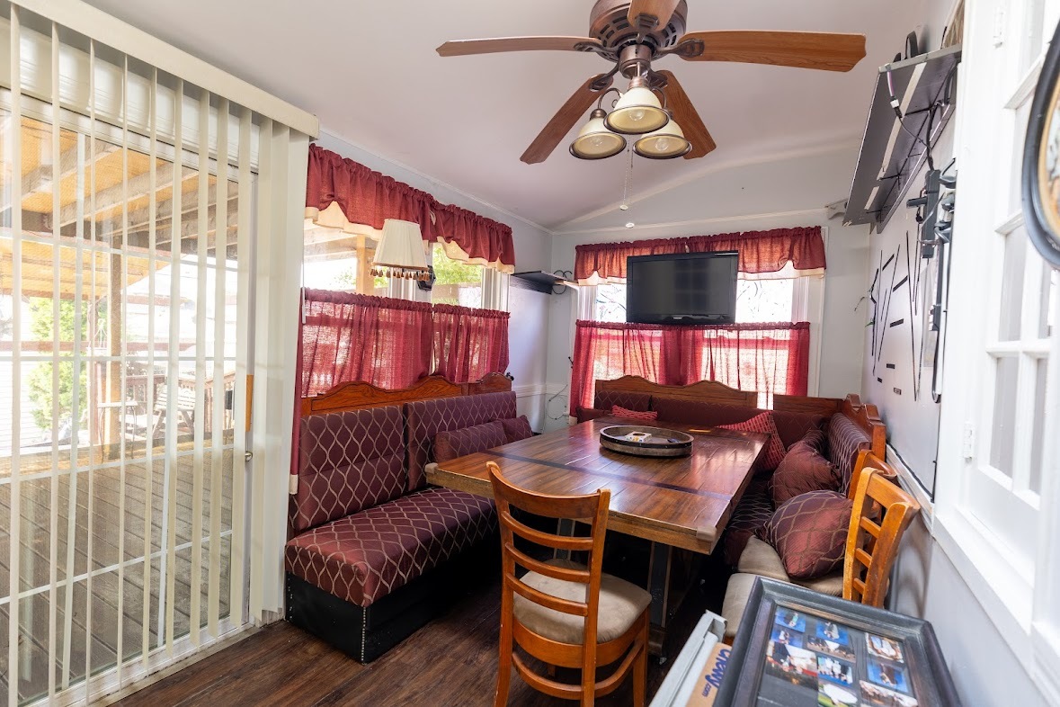6840 29th Place Berwyn, IL 60402 - Photo 13 of 32 a living room with furniture and a window