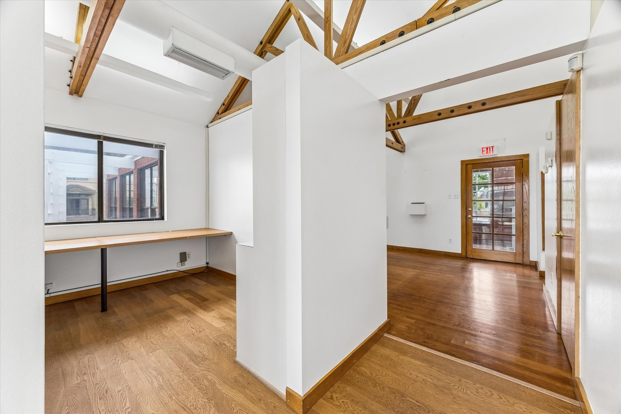 2402 Commonwealth Street Houston, TX 77006 - Photo 7 of 45 a view of empty room with wooden floor and fan