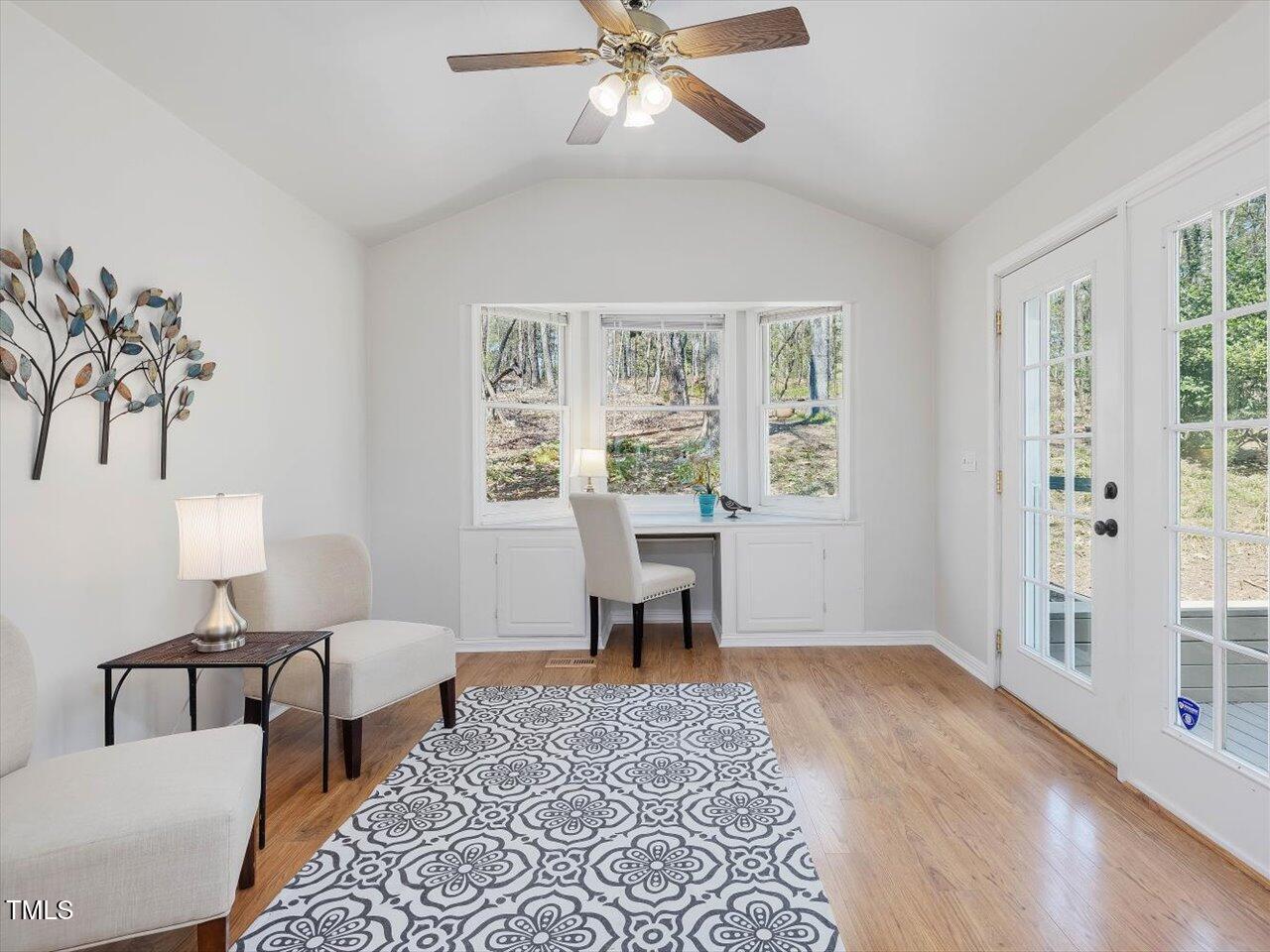 4818 Glendarion Drive Durham, NC 27713 - Photo 13 of 44 a living room with furniture and a window