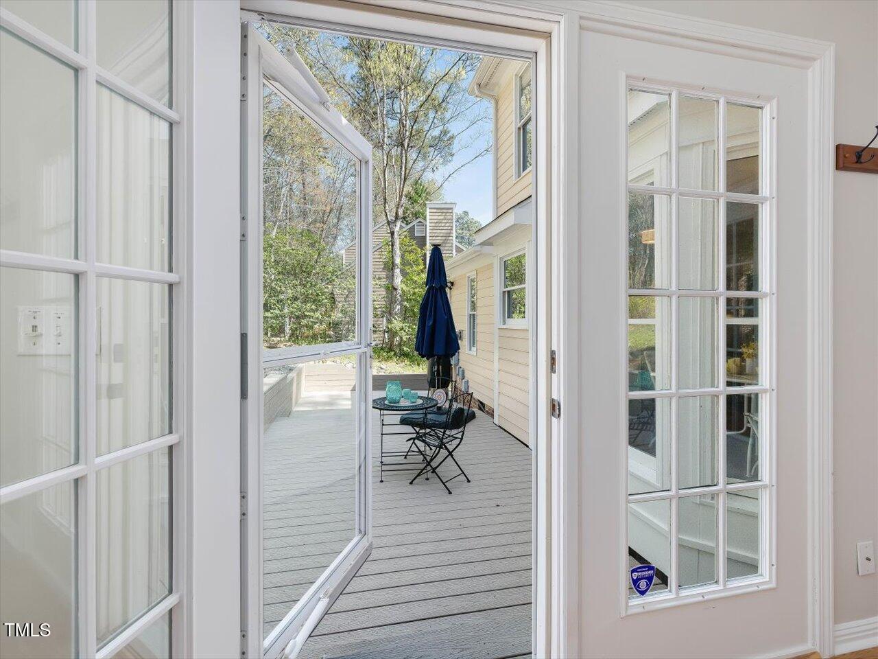 4818 Glendarion Drive Durham, NC 27713 - Photo 16 of 44 a view of a livingroom with wooden floor and furniture