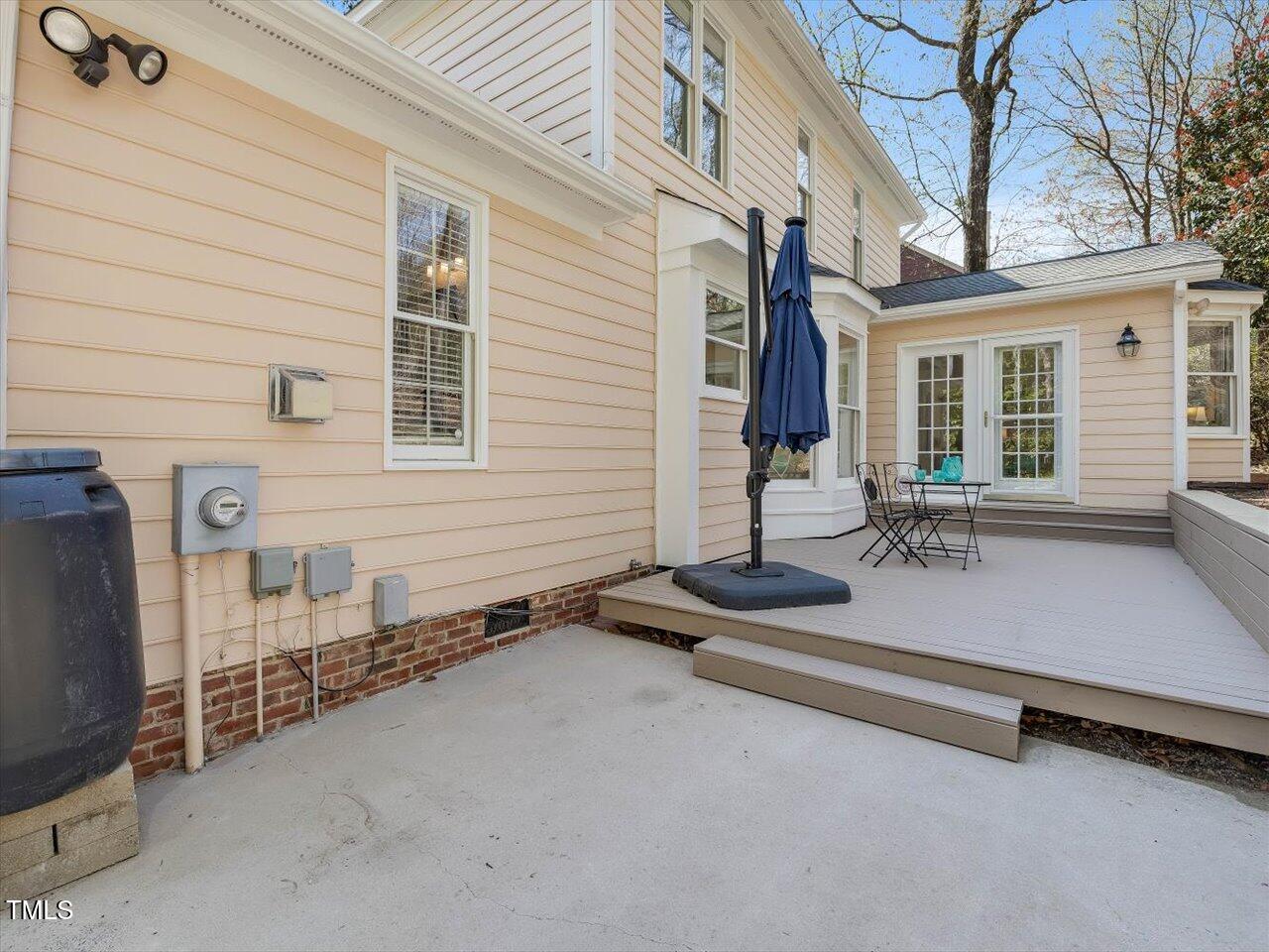 4818 Glendarion Drive Durham, NC 27713 - Photo 19 of 44 a view of a building with floor to ceiling windows and wooden walls
