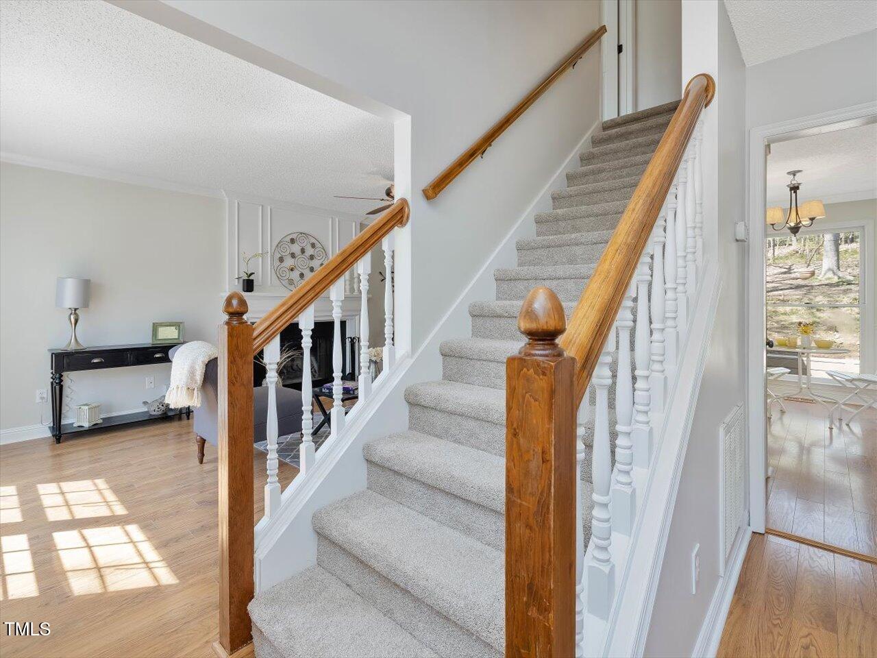 4818 Glendarion Drive Durham, NC 27713 - Photo 29 of 44 a view of entryway and hall with wooden floor