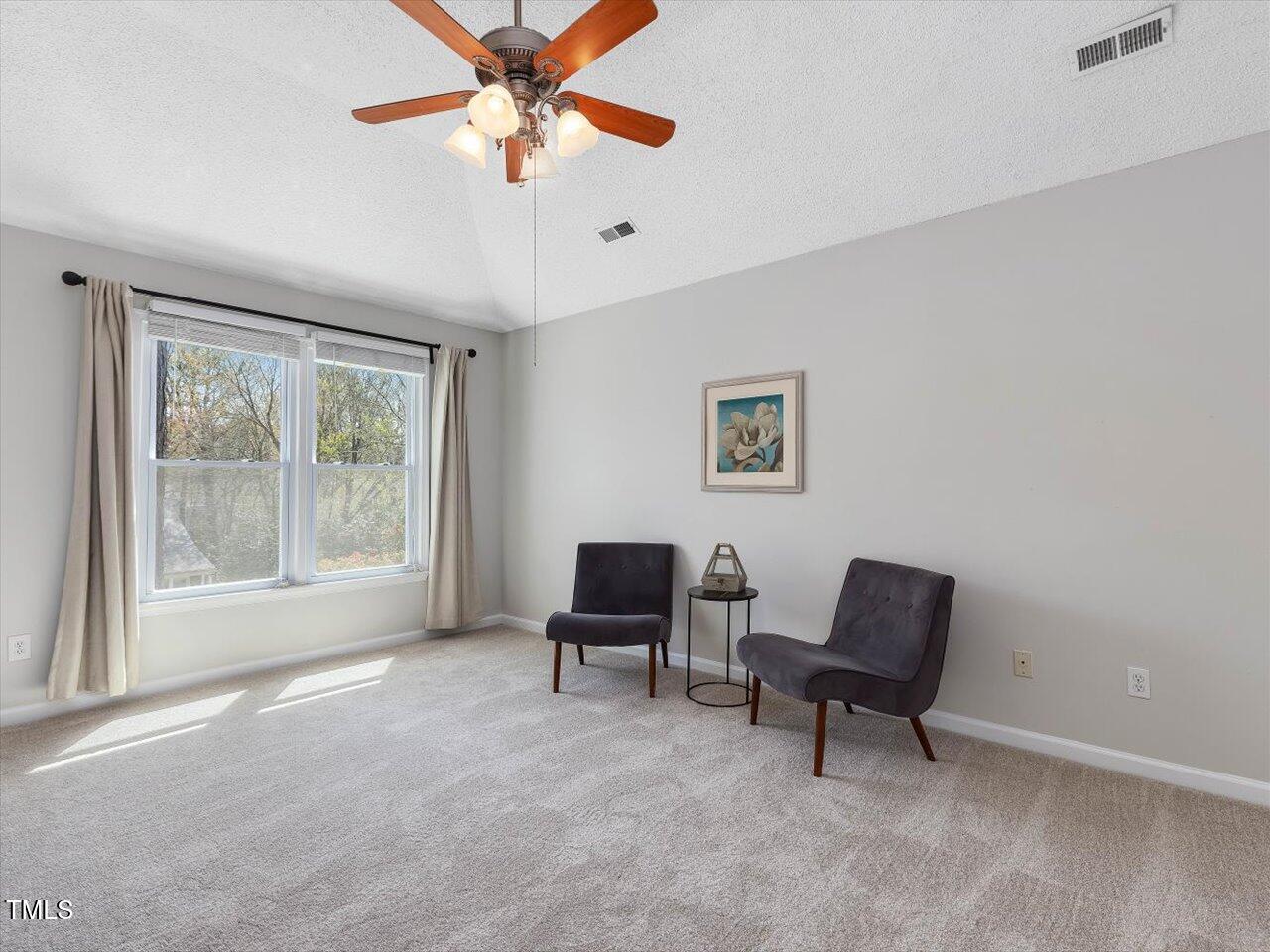 4818 Glendarion Drive Durham, NC 27713 - Photo 30 of 44 a living room with furniture and a window
