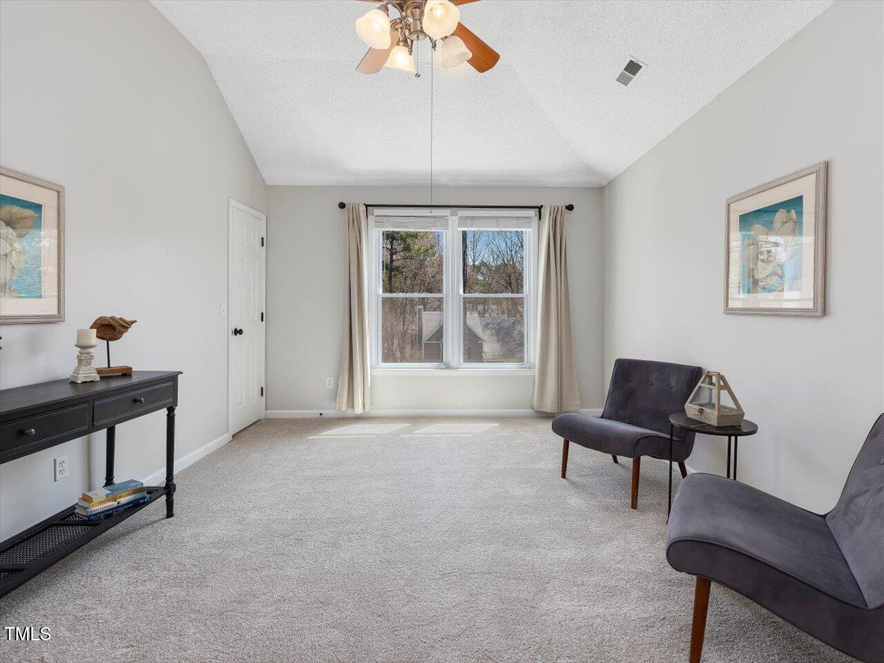 4818 Glendarion Drive Durham, NC 27713 - Photo 31 of 44 a living room with furniture and a window