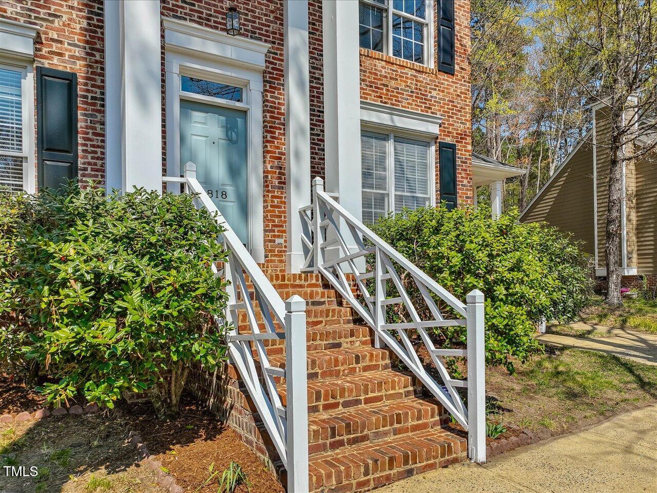 4818 Glendarion Drive Durham, NC 27713 - Photo 4 of 44 front view of a house with stairs