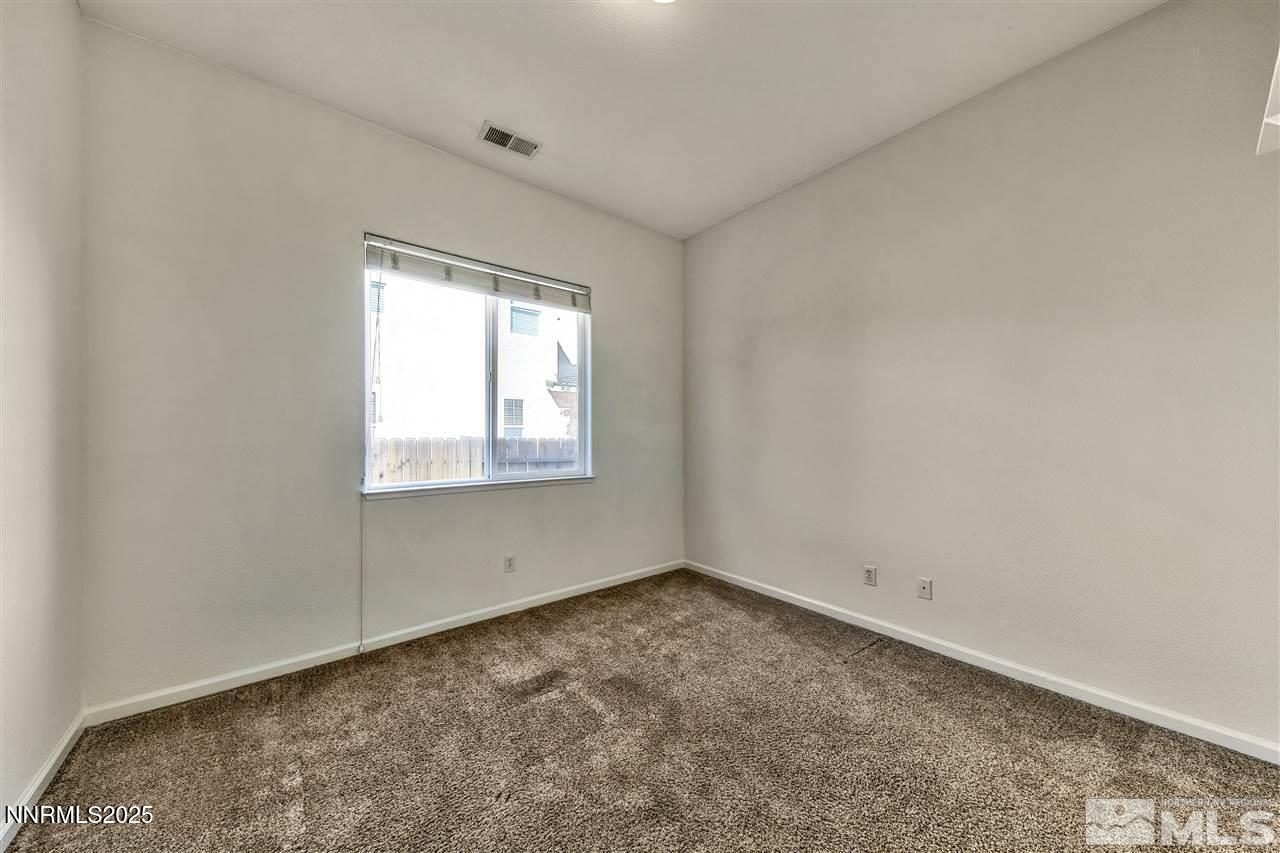 1830 Kodiak Circle Reno, NV 89511 - Photo 18 of 27 an empty room with a window