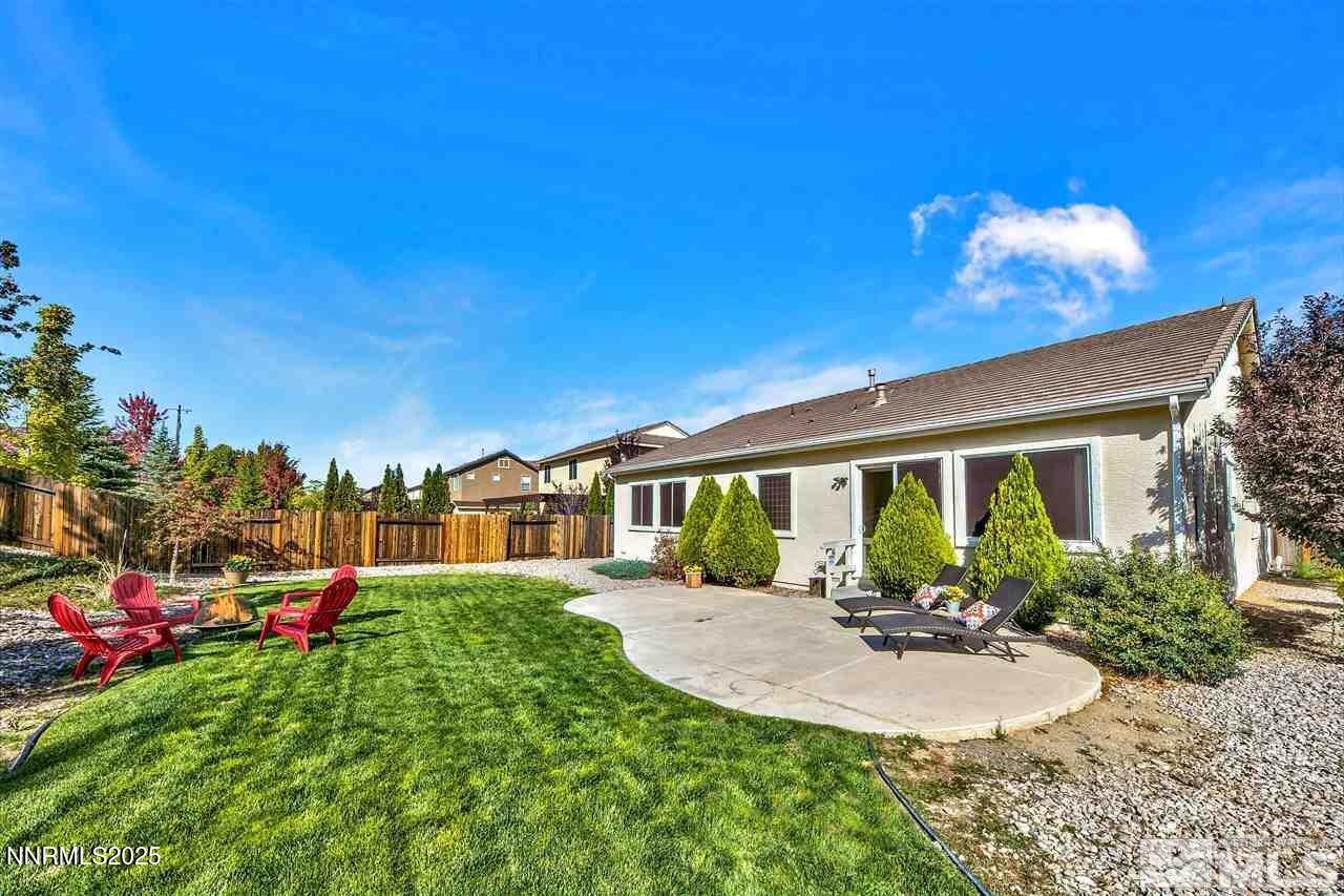 1830 Kodiak Circle Reno, NV 89511 - Photo 25 of 27 a view of a house with a yard and potted plants