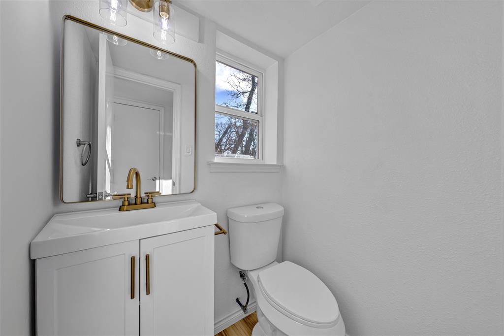 857 Timberhill Drive Hurst, TX 76053 - Photo 32 of 40 Half Bath Downstairs