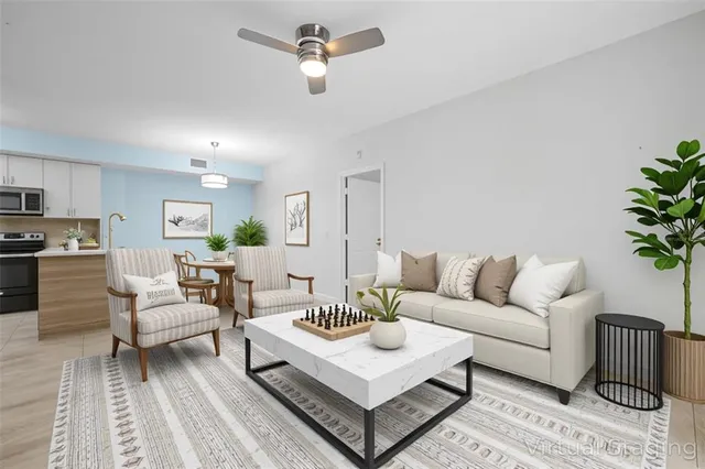 an empty room with a kitchen and a sink