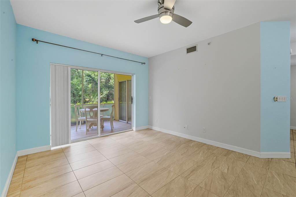 6401 Aragon Way, Unit 103 Fort Myers, FL 33966 - Photo 15 of 40 a view of an empty room with a window