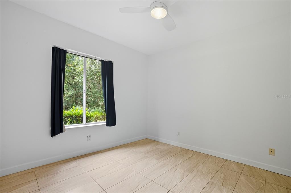 6401 Aragon Way, Unit 103 Fort Myers, FL 33966 - Photo 23 of 40 a view of a room that has a window in it